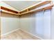 Large walk-in closet with shelving and hanging rods at 17200 W Bell Rd # 1581, Surprise, AZ 85374
