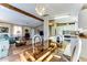 Kitchen and dining area with glass table and chandelier at 17200 W Bell Rd # 1581, Surprise, AZ 85374