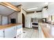Kitchen features white cabinets, double ovens, and a breakfast bar at 17200 W Bell Rd # 1581, Surprise, AZ 85374
