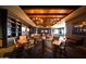 Elegant clubhouse with seating, TVs, and games at 17574 W Cardinal Dr, Goodyear, AZ 85338