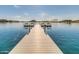 Wooden dock with benches overlooking the lake at 17574 W Cardinal Dr, Goodyear, AZ 85338
