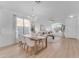 Open concept living and dining area with light and bright aesthetic at 17574 W Cardinal Dr, Goodyear, AZ 85338