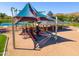 Playground with shade structure and slides at 17574 W Cardinal Dr, Goodyear, AZ 85338