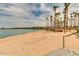 Sandy beach with ramadas and lake access at 17574 W Cardinal Dr, Goodyear, AZ 85338