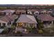 Aerial view of home showcasing backyard patio and fire pit at 17848 E Stocking Trl, Rio Verde, AZ 85263