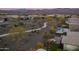 Community and home aerial view showcasing desert landscape, pool, and fire pit at 17848 E Stocking Trl, Rio Verde, AZ 85263