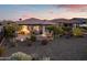 Relaxing backyard oasis with fire pit and covered patio at 17848 E Stocking Trl, Rio Verde, AZ 85263