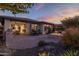 Outdoor patio features a fire pit and seating area at 17848 E Stocking Trl, Rio Verde, AZ 85263