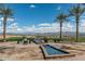 Stone patio with water features and comfortable seating at 17848 E Stocking Trl, Rio Verde, AZ 85263