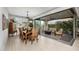 Elegant dining room with sliding glass doors leading to a relaxing patio at 17848 E Stocking Trl, Rio Verde, AZ 85263