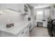Spacious laundry room with ample counter space and storage at 17848 E Stocking Trl, Rio Verde, AZ 85263
