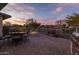 Brick patio features fire pit, seating, and grill at 17848 E Stocking Trl, Rio Verde, AZ 85263