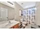 Bathroom with shower/tub, vanity, and linen cabinet at 18963 N Vemto St, Maricopa, AZ 85138