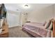 Bedroom with double bed, closet, and TV at 18963 N Vemto St, Maricopa, AZ 85138