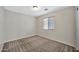 Bright bedroom with window and closet at 18963 N Vemto St, Maricopa, AZ 85138