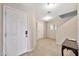 Inviting entryway with tiled floors and a coat closet at 18963 N Vemto St, Maricopa, AZ 85138