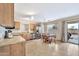 Eat-in kitchen with stainless steel appliances and backyard access at 18963 N Vemto St, Maricopa, AZ 85138