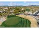Golf course green with luxury homes in the background at 19910 N 84Th St, Scottsdale, AZ 85255