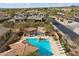Aerial view of community pool, spa, and surrounding homes at 19910 N 84Th St, Scottsdale, AZ 85255