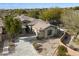 Aerial view showcasing a single-story home's exterior and landscaping at 19910 N 84Th St, Scottsdale, AZ 85255
