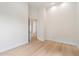 Simple bedroom with hardwood floors and access to hallway at 19910 N 84Th St, Scottsdale, AZ 85255