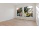 Spacious bedroom with hardwood floors and backyard view at 19910 N 84Th St, Scottsdale, AZ 85255