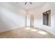 Bright bedroom with hardwood floors and large window at 19910 N 84Th St, Scottsdale, AZ 85255