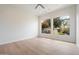 Bright bedroom with hardwood floors and large windows at 19910 N 84Th St, Scottsdale, AZ 85255