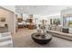 Open-concept living space with kitchen, dining, and living areas, featuring modern decor and neutral tones at 19910 N 84Th St, Scottsdale, AZ 85255