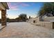 Outdoor kitchen with built-in grill, fireplace, and sink at 19910 N 84Th St, Scottsdale, AZ 85255