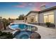 Relaxing backyard oasis with a freeform pool and spa at 19910 N 84Th St, Scottsdale, AZ 85255