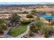 Community tennis courts and a covered patio area at 19910 N 84Th St, Scottsdale, AZ 85255