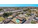Expansive aerial view showcasing a home with a private pool in a vibrant neighborhood, near freeway access at 2037 E Riviera Dr, Tempe, AZ 85282