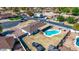 An aerial view of a backyard pool and patio with a fence at 2037 E Riviera Dr, Tempe, AZ 85282