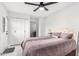 Bright bedroom with a double bed and white closet at 2037 E Riviera Dr, Tempe, AZ 85282