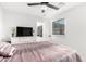 Bedroom with a double bed, TV, and dresser at 2037 E Riviera Dr, Tempe, AZ 85282