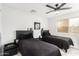 Bedroom with two twin beds and ceiling fan at 2037 E Riviera Dr, Tempe, AZ 85282
