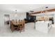 Spacious dining area with large wooden table and seating for six at 2037 E Riviera Dr, Tempe, AZ 85282