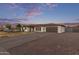 A single-story home with a well-manicured lawn and driveway at 2037 E Riviera Dr, Tempe, AZ 85282