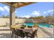 Inviting pool with patio furniture and a relaxing atmosphere at 21697 N 77Th Pl, Scottsdale, AZ 85255