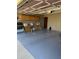 Spacious garage featuring built-in cabinets, painted floors, and ample storage options at 2331 W Onza Ave, Mesa, AZ 85202