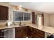 Kitchen features granite countertops and stainless steel appliances at 2331 W Onza Ave, Mesa, AZ 85202
