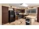 Kitchen boasts granite countertops and stainless steel appliances at 2331 W Onza Ave, Mesa, AZ 85202