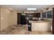 View of kitchen with granite counters and stainless steel appliances at 2331 W Onza Ave, Mesa, AZ 85202