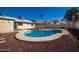 Refreshing backyard pool with ample lounging space at 2331 W Onza Ave, Mesa, AZ 85202