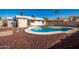 Relaxing kidney-shaped pool in a sunny backyard at 2331 W Onza Ave, Mesa, AZ 85202