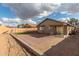 Spacious backyard with brick patio and grassy area at 25700 W St James Ave, Buckeye, AZ 85326