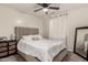 Bright bedroom with a queen bed and built-in mirror at 25700 W St James Ave, Buckeye, AZ 85326