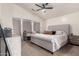 Serene main bedroom with a king-size bed and en-suite bathroom access at 25700 W St James Ave, Buckeye, AZ 85326