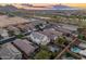 Community view showcasing surrounding homes and landscape at 26234 W Behrend Dr, Buckeye, AZ 85396